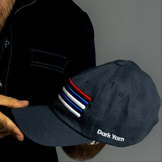 Dark Yarn Nautilus Reserve Dockside Cap, stylish headwear with nautical design and adjustable fit, perfect for casual wear.