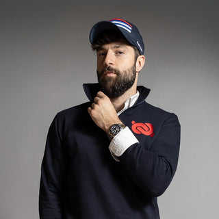 Dark Yarn Nautilus Reserve Dockside Cap, stylish navy headwear with nautical design, adjustable fit, and breathable fabric.