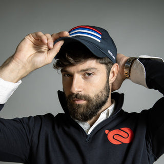 Dark Yarn Nautilus Reserve Dockside Cap, stylish navy headwear with adjustable strap and embroidered logo, casual maritime style.