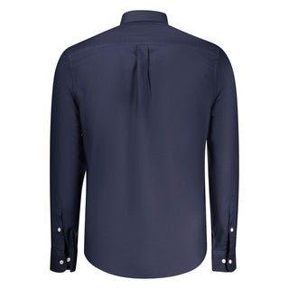 Blue cotton male shirt by Norway 1963, showcasing a classic fit with button-up front and collar.