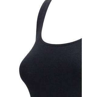 Black cotton bodysuit by Wolford, close-up of fitted design and seamless construction on a neutral background.