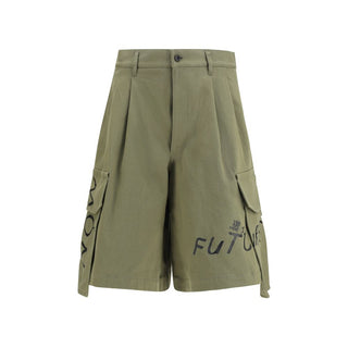 Bicolor cotton Bermuda shorts by Comme Des Garçons featuring a stylish two-tone design and a comfortable fit.
