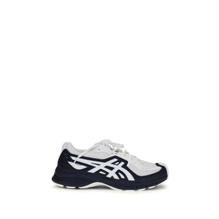 Black polyester athletic sneakers by Comme Des Garçons, featuring sleek design and sporty style for active wear.
