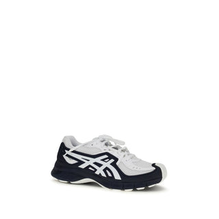 Black polyester athletic sneakers by Comme Des Garçons with sleek design and sporty style.