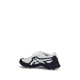 Black polyester athletic sneakers by Comme Des Garçons with sleek design and sporty sole for active wear.