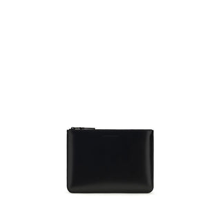Black calf leather Bos Taurus wallet by Comme Des Garçons, featuring sleek design and multiple card slots.