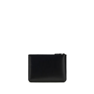 Black Calf Leather Bos Taurus Wallet by Comme Des Garçons, showing the sleek, minimalist design with textured leather surface.