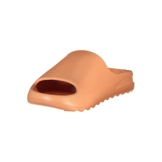 Orange polyurethane women's slipper by Norway 1963, showing a comfortable slip-on shoe with a textured sole and soft interior.
