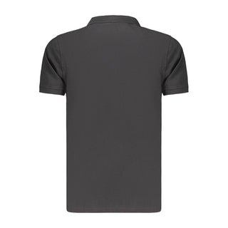 Black cotton women's polo shirt by Norway 1963, featuring a classic collar and short sleeves on a plain background.