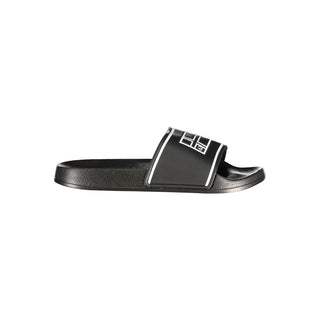 Black polyurethane men's slipper from Norway 1963, featuring a comfortable slip-on design and cushioned sole.