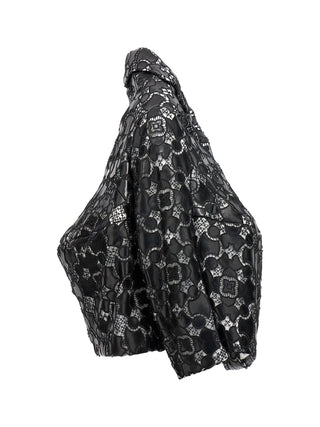 Bicolor polyethylene leather jacket by Comme Des Garçons featuring a modern, stylish design with contrasting colors.