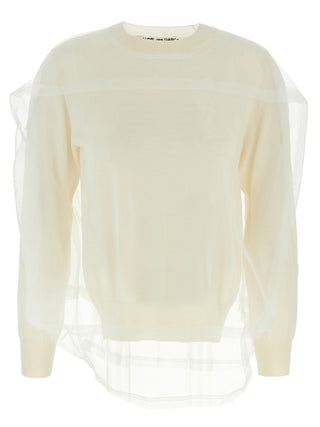 White wool cardigan by Comme Des Garçons, featuring a classic knit design and button closure, displayed on a plain background.