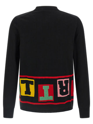 Black acetate cardigan by Comme Des Garçons, featuring a relaxed fit and contemporary design, shown on a model.