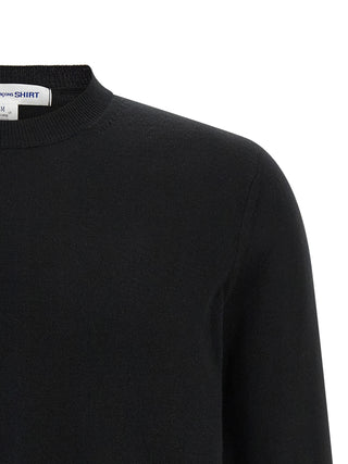 Black acetate cardigan by Comme Des Garçons, featuring a relaxed fit with ribbed cuffs and a front button closure.