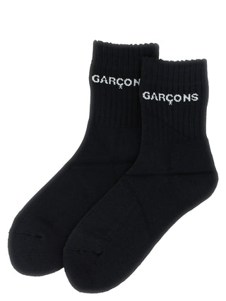 Bicolor cotton socks by Comme Des Garçons featuring a stylish dual-tone design and comfortable fit.