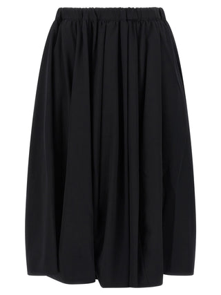 Black wool mini skirt by Comme Des Garçons, stylish and fitted with a sleek, modern design.