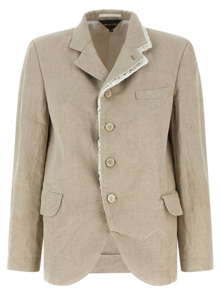 Beige linen blazer by Comme Des Garçons, tailored fit with classic lapels and textured fabric, displayed on a hanger.
