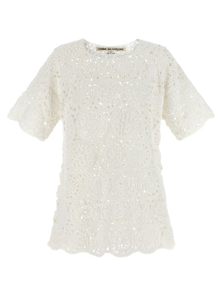 White cotton T-shirt by Comme Des Garçons with a classic fit and minimalist design, shown flat on a white background.