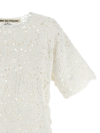 White cotton T-shirt by Comme Des Garçons, plain design, soft fabric, casual fit, front view, high-quality material.