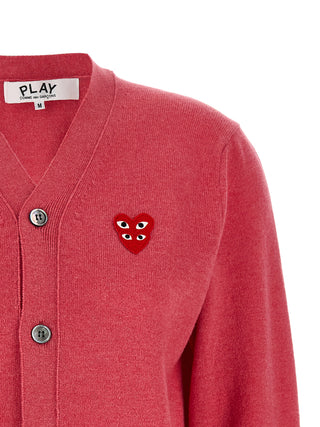 Multicolor wool cardigan by Comme Des Garçons Play featuring a vibrant, patterned knit design and button closure.