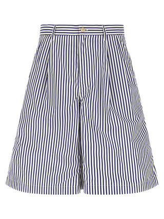 Blue cotton Bermuda shorts by Comme Des Garçons, featuring a relaxed fit and casual style, shown on a model.