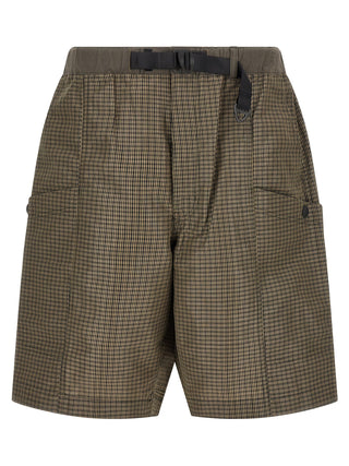 Bicolor linen Bermuda shorts by Comme Des Garçons featuring a stylish two-tone design and relaxed fit.