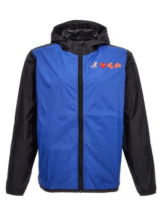 Blue nylon shell jacket by Comme Des Garçons Play, showing a lightweight, water-resistant outerwear with a sleek design.