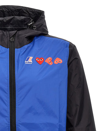 Blue nylon shell jacket by Comme Des Garçons Play with a sleek design, featuring a lightweight, water-resistant outer layer.