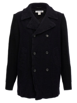 Blue wool coat by Comme Des Garçons, shown on a mannequin, featuring a tailored fit and classic collar design.