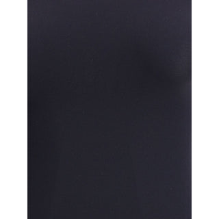 Black Wolford polyamide bodysuit with long sleeves and sleek fit, showcasing smooth fabric and modern design.