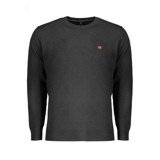 Black wool men’s sweater by Norway 1963, featuring a classic knit pattern and ribbed cuffs, displayed on a mannequin.