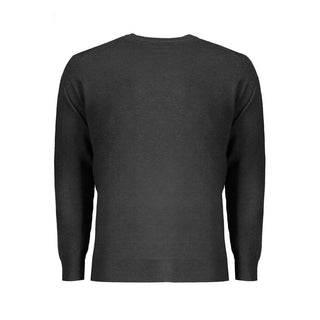 Black wool men's sweater by Norway 1963, featuring a classic knit design and ribbed cuffs and hem.