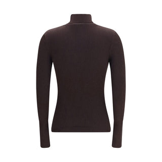 Brown wool Aries turtleneck sweater by Wolford, featuring a cozy fit and ribbed collar, styled on a mannequin.