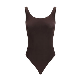 Brown cotton bodysuit by Wolford, featuring a fitted design and long sleeves, displayed on a white background.