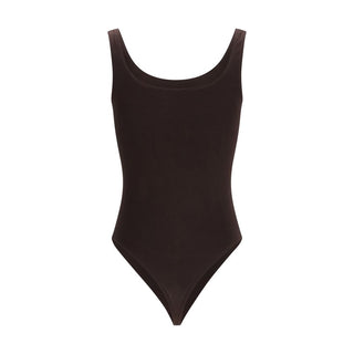 Brown cotton bodysuit by Wolford featuring long sleeves and a fitted design, shown on a mannequin.