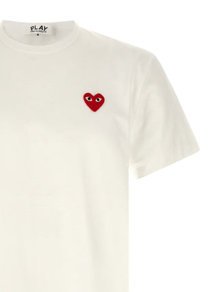 White cotton T-shirt by Comme Des Garçons Play, featuring a simple design and soft fabric, shown on a plain background.