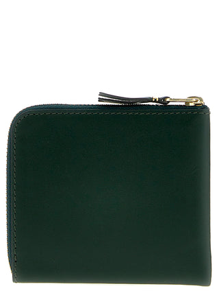 Bicolor calfskin cardholder by Comme Des Garçons featuring a sleek, compact design with multiple card slots and a smooth finish.