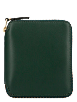 Bicolor calfskin wallet by Comme Des Garçons featuring a sleek, compact design with contrasting colors and minimalist style.