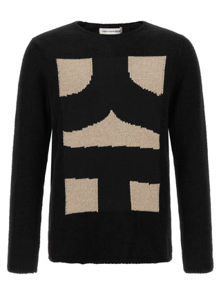 Black polyester cardigan by Comme Des Garçons, featuring a relaxed fit with a knit texture and ribbed cuffs.