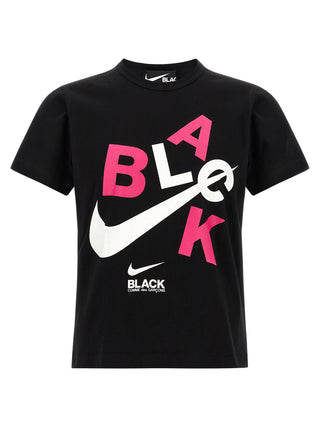Black cotton T-shirt by Comme Des Garçons, showing front view with crew neckline and minimalistic design.