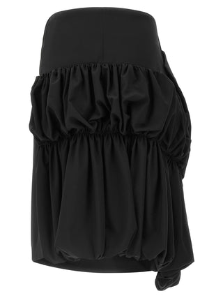 Black wool midi skirt by Comme Des Garçons, featuring a sleek, tailored design with a high waist and midi length.