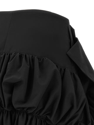 Black wool midi skirt by Comme Des Garçons, featuring a sleek, tailored design and mid-length silhouette.