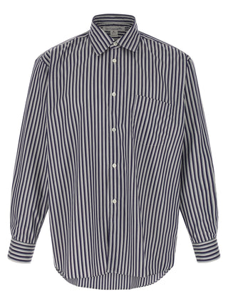 Blue cotton blouse by Comme Des Garçons, featuring a relaxed fit and classic collar, displayed on a hanger.