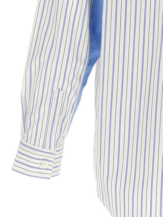 Multicolor cotton blouse by Comme Des Garçons with a relaxed fit and vibrant fabric, displayed on a plain background.