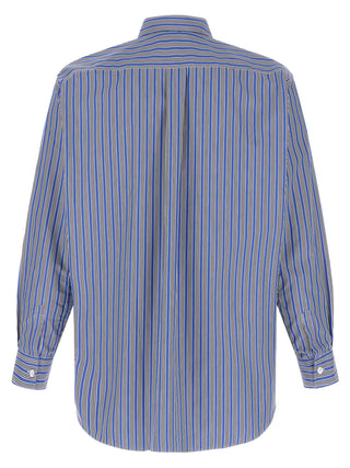 Blue cotton blouse by Comme Des Garçons, featuring a relaxed fit, long sleeves, and a classic collar.