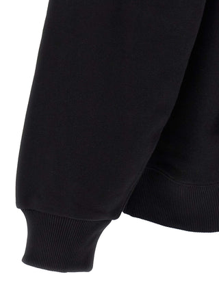 Black Carhartt Wip cotton sweatshirt with ribbed cuffs and crew neckline, displayed flat on a white background.