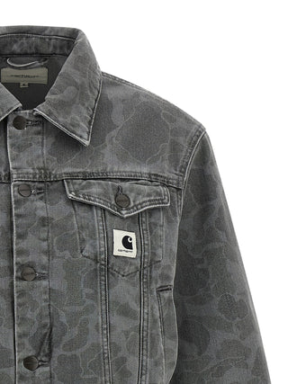 Gray organic cotton denim jacket by Carhartt Wip, featuring classic design and durable fabric, shown on a plain background.