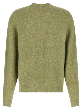 Bicolor acetate cardigan by Carhartt Wip featuring a stylish two-tone design and button front, worn by a model.