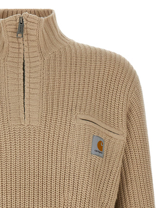 Beige Carhartt Wip acetate cardigan with button closure, knitted fabric, and ribbed cuffs, displayed on a hanger.