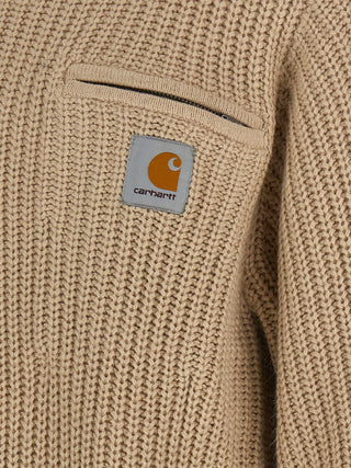 Beige acetate cardigan by Carhartt Wip, lightweight knit with button closure, styled on a model for a casual look.